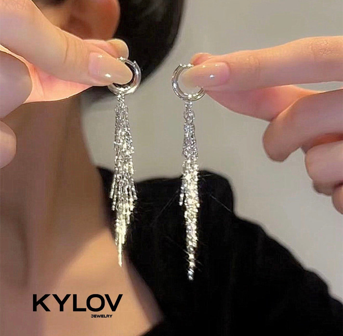 Arete colgante plateado