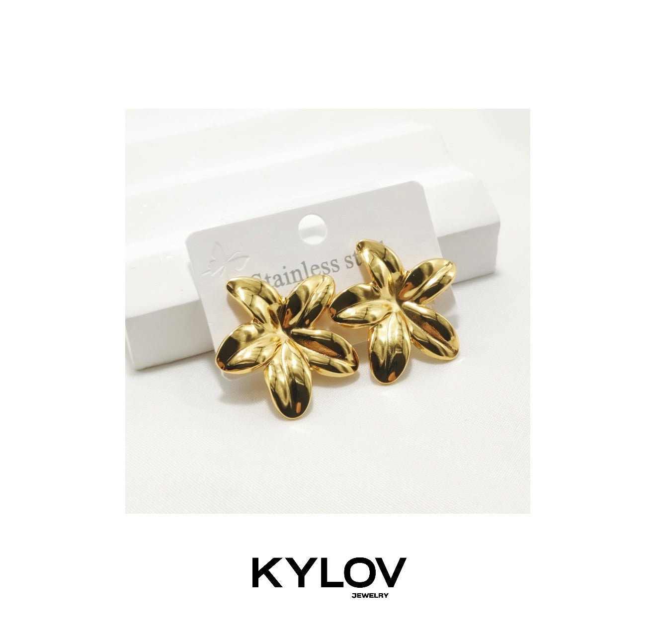 Aretes flor dorada