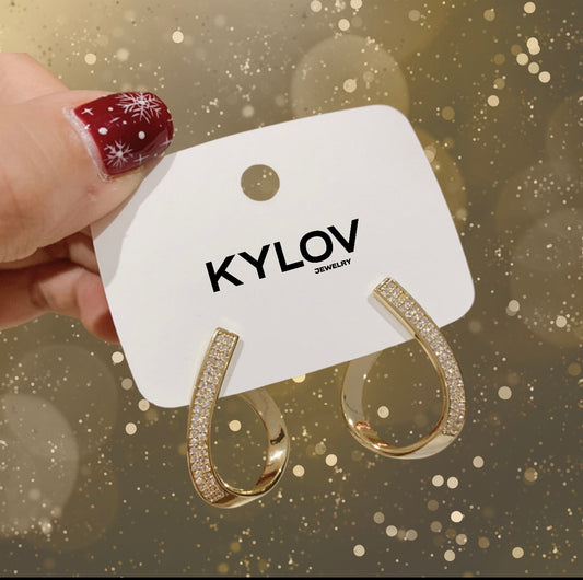 Aretes en forma de gotas de agua con brillantes